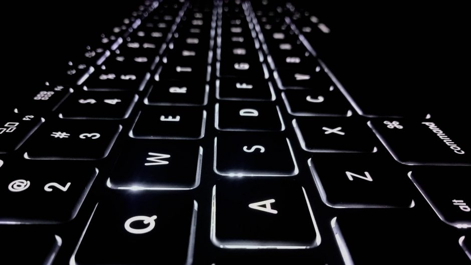 closeup photo of black and white Apple keyboard keys